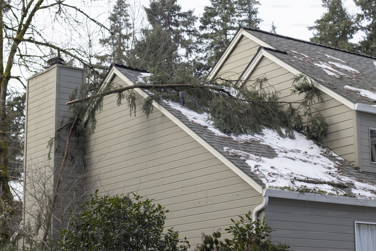 Overflowing old gutters on a NJ home